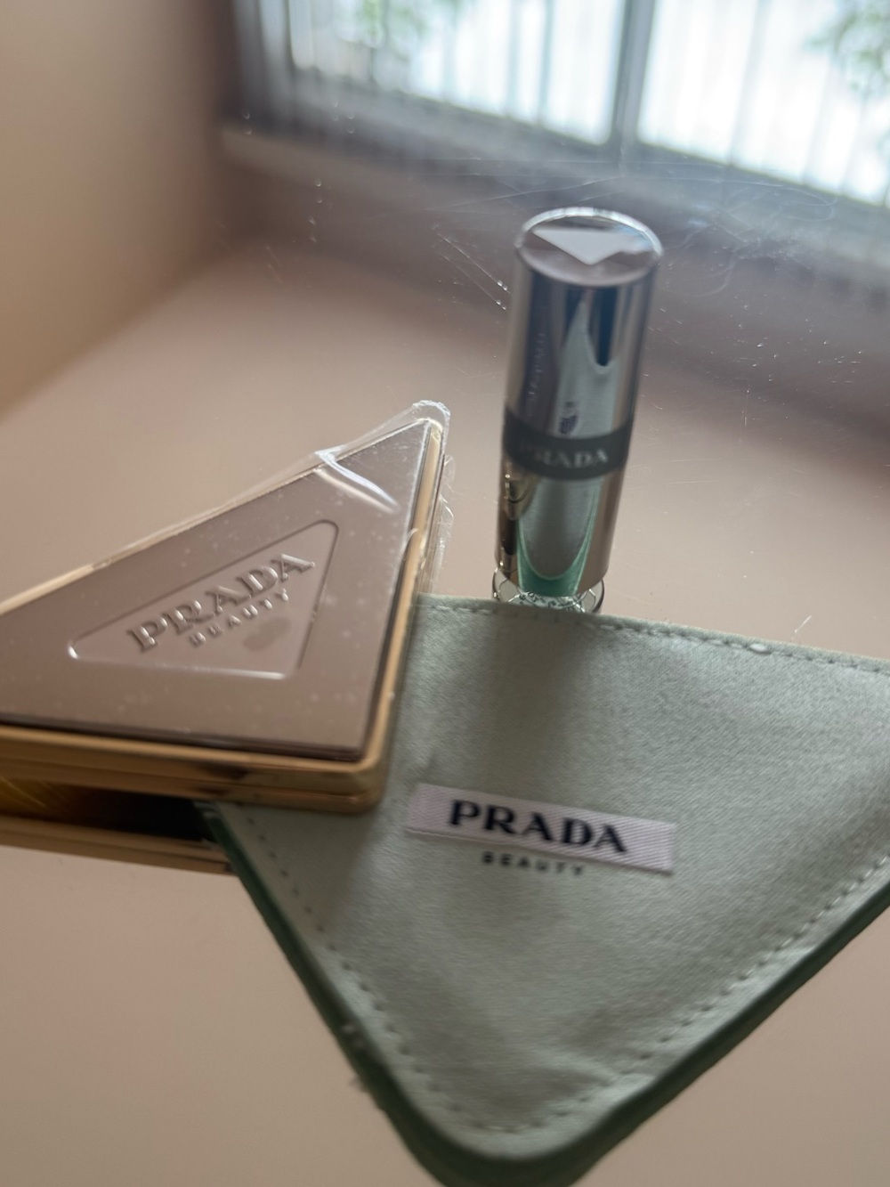 Prada Gold Compact Mirror with mini Prada lip balm!